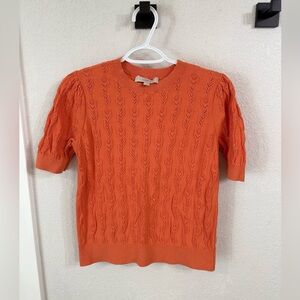 Vibrant Orange Crewneck Sweater with Textured Knit Pattern